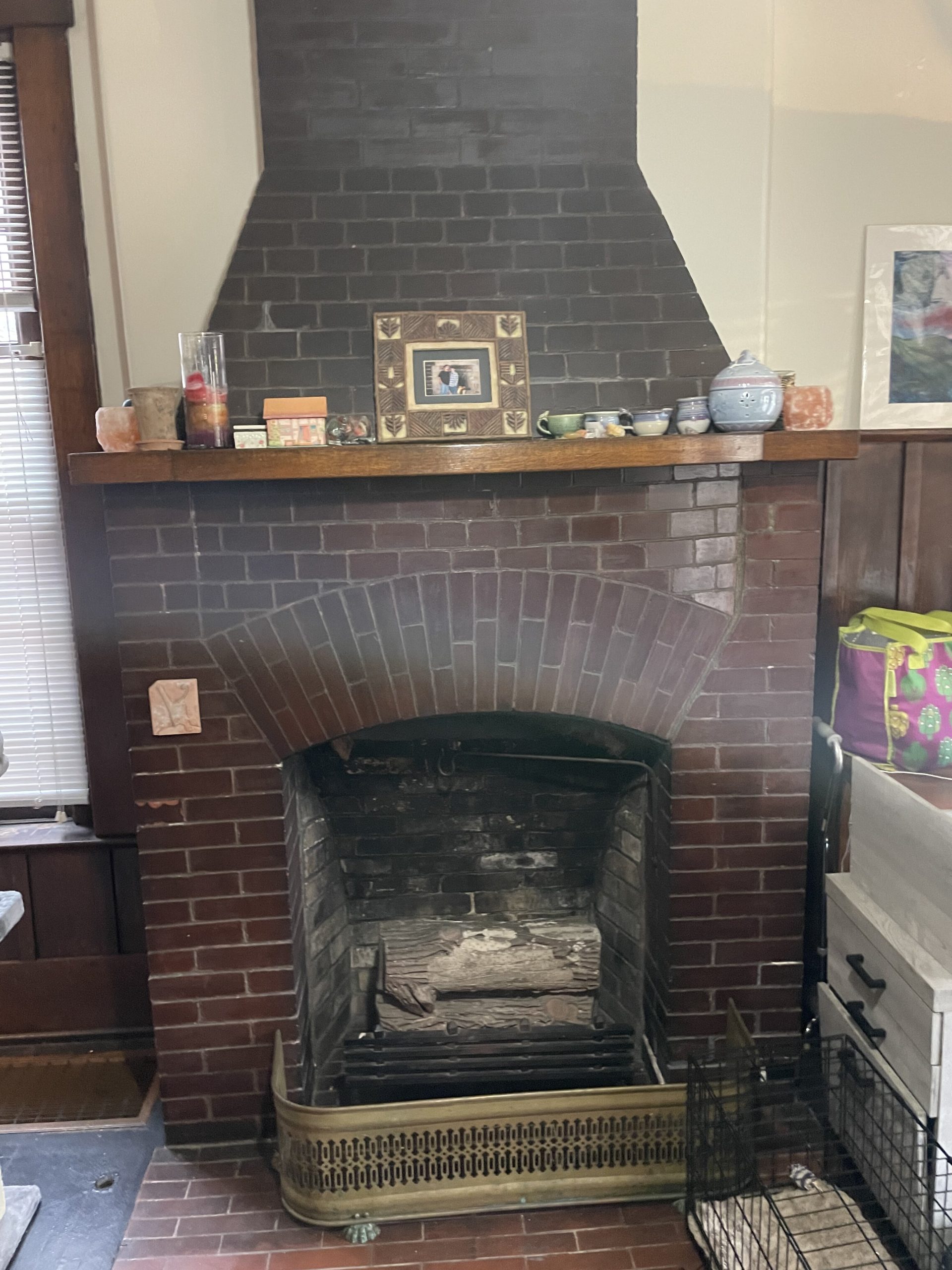 The entry fireplace in apartment 1 at 1264 Cherokee Road