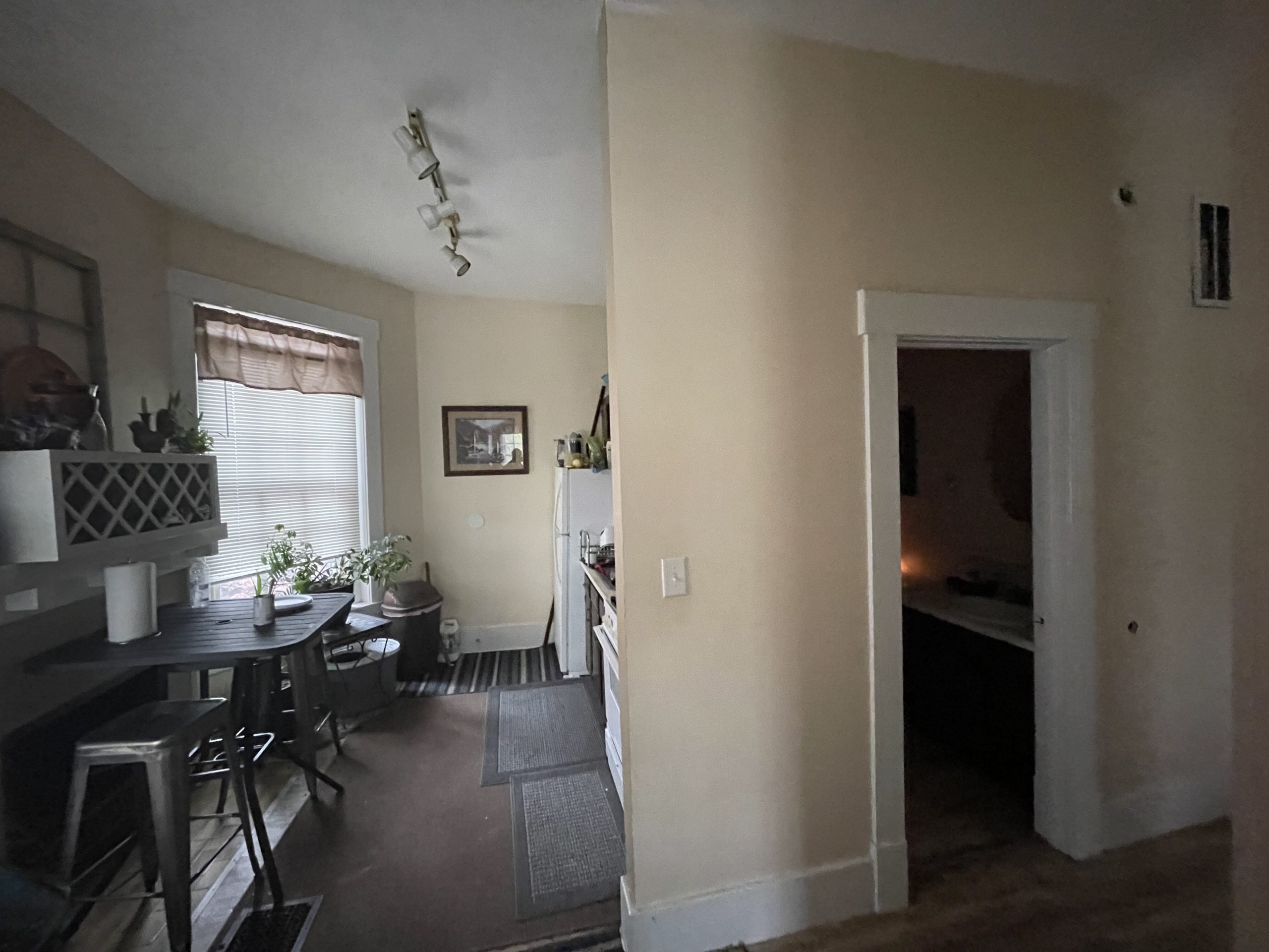 The kitchen from the living room in apartment 3 at 1264 Cherokee Road