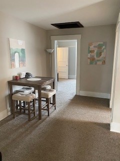 The living room of apartment 5 at 1264 Cherokee Road