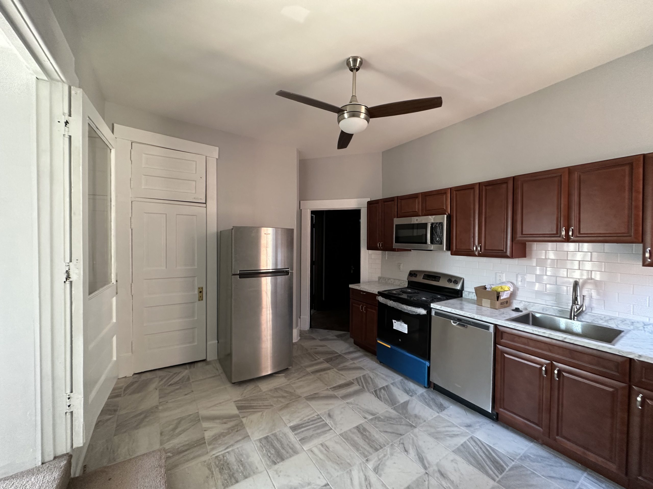 The kitchen with the pantry closed in apartment 4 at 1264 Cherokee Road
