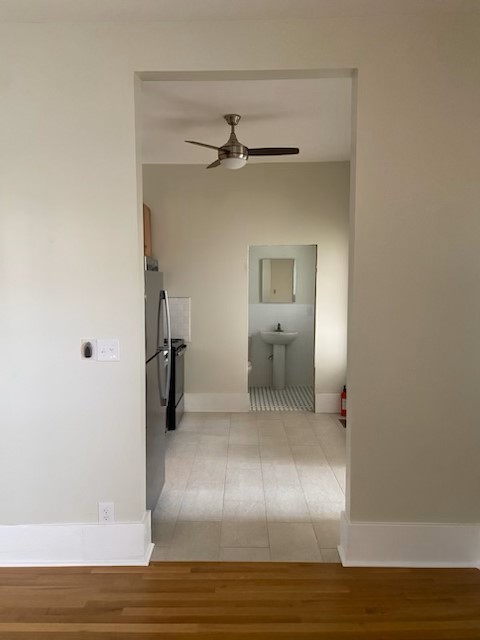 The remodeled living room and kitchen in apartment 2 at 1264 Cherokee Road
